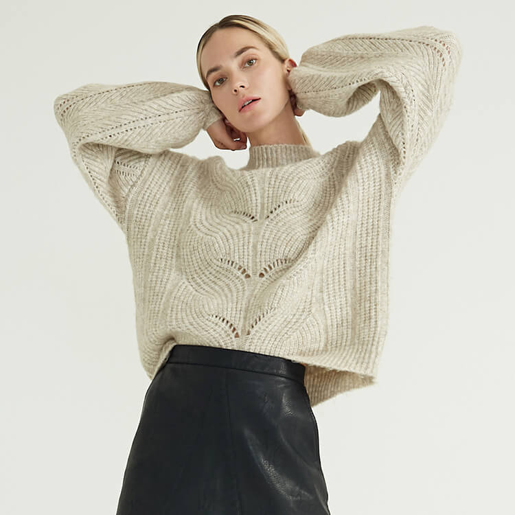 Suéter de algodón avanzado simple de cuello medio de color sólido de moda para mujer